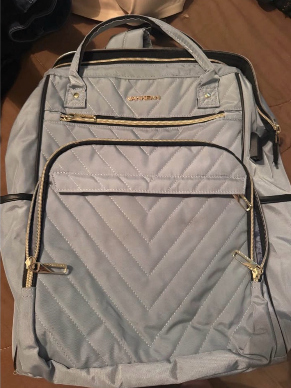 Tumi Light Gray Quilted Laptop Backpack with Gold Hardware